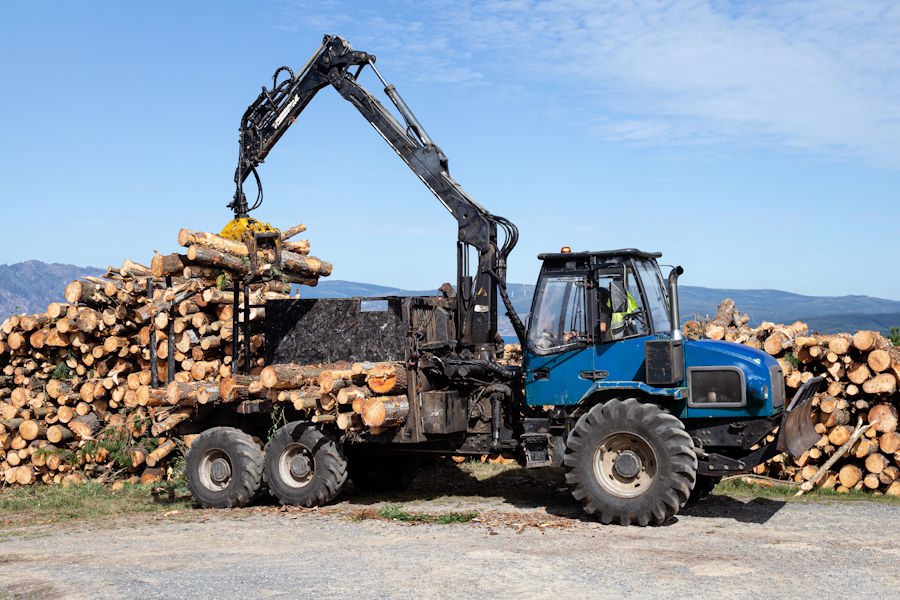 This overpriced piece of machinery is called a forwarder. They are bulky, they are pricey and they are not very flexible, in the sense of multipurpose use. Well, maybe that was taking things a bit too far. :) They are actually great, but with everyting, there are some downsides, as mentioned.